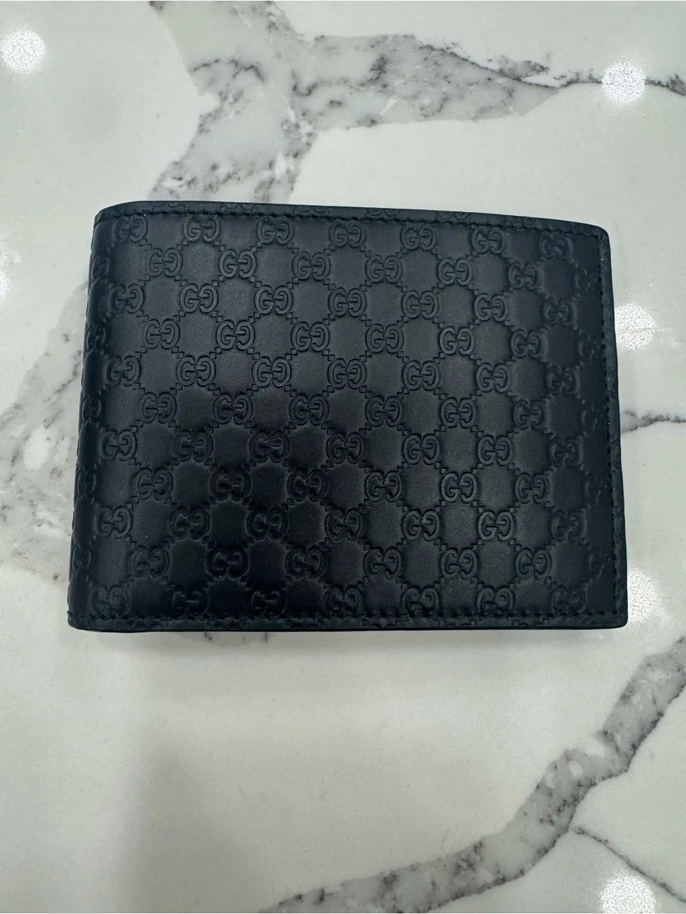 Gucci Black Embossed GG Leather Wallet